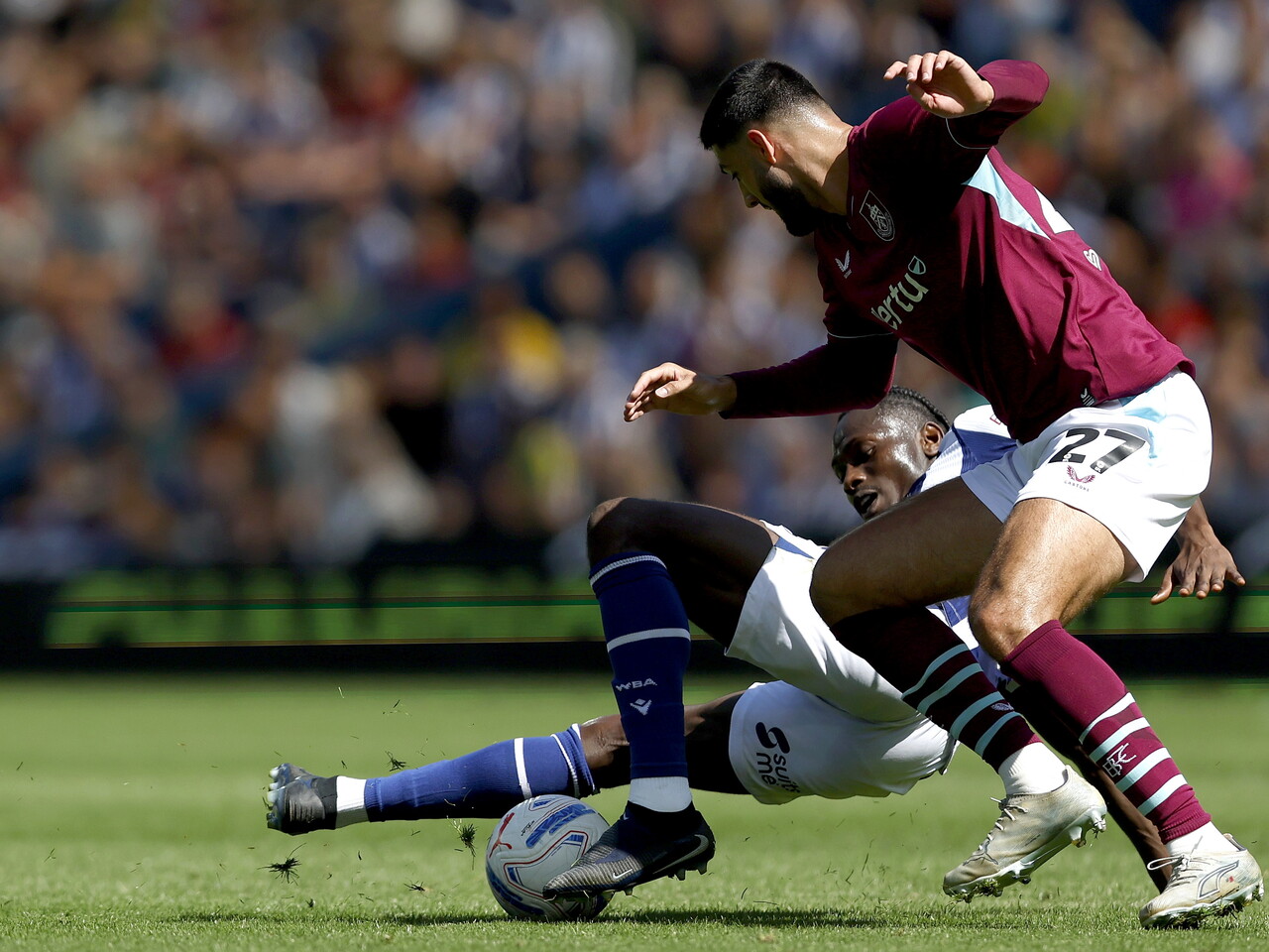 Ousmane Diakite makes a tackle against Burnley