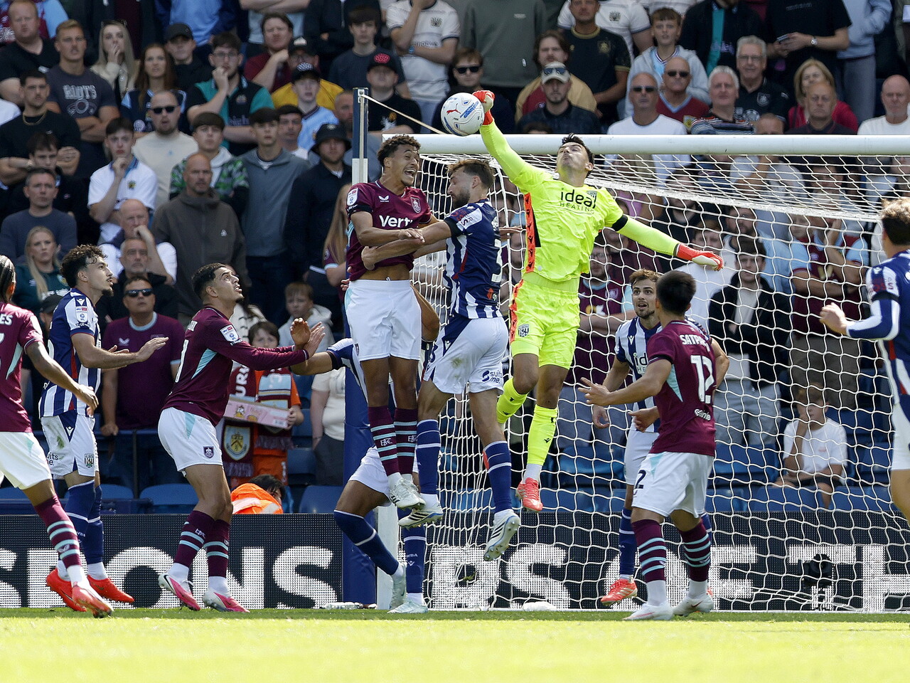 Max O'Leary punches the ball against Burnley