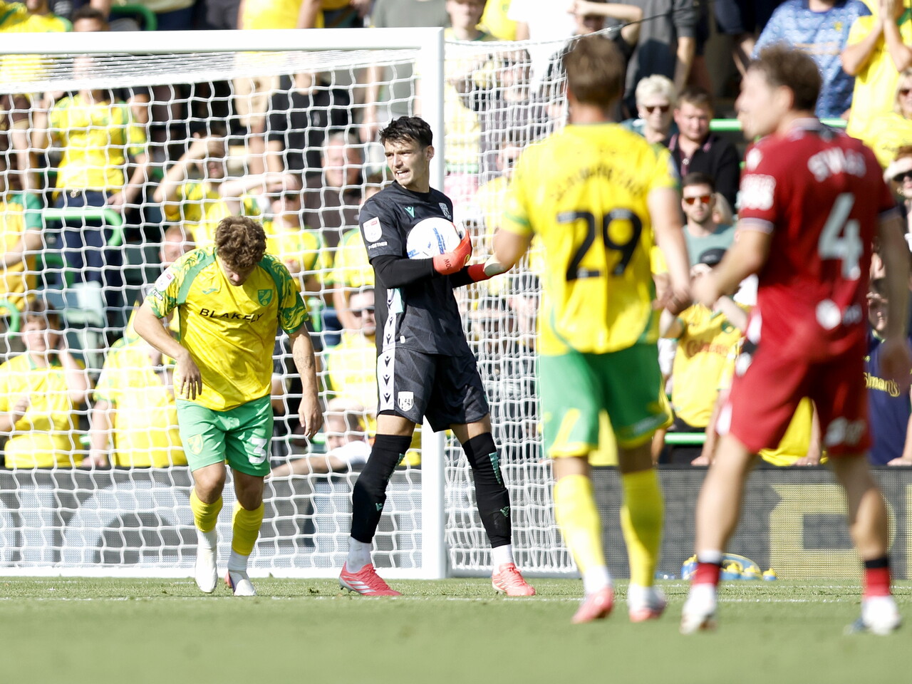 Max O'Leary catches the ball against Norwich