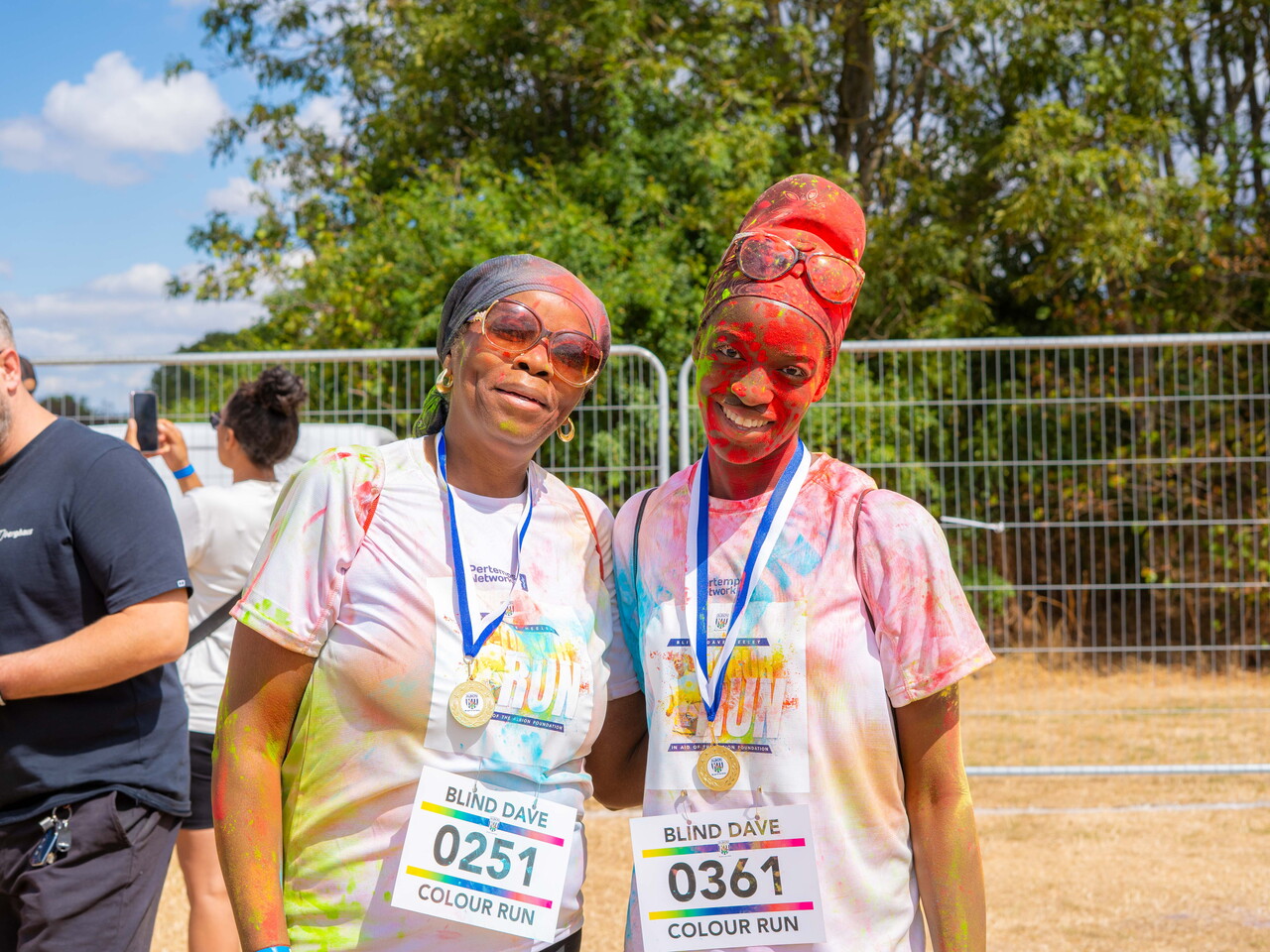 Participants posing for a photo after the Colour Run.