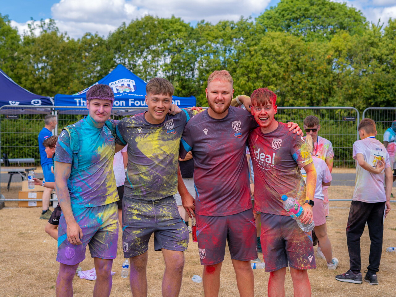 Foundation staff posing for a photo after the Colour Run.