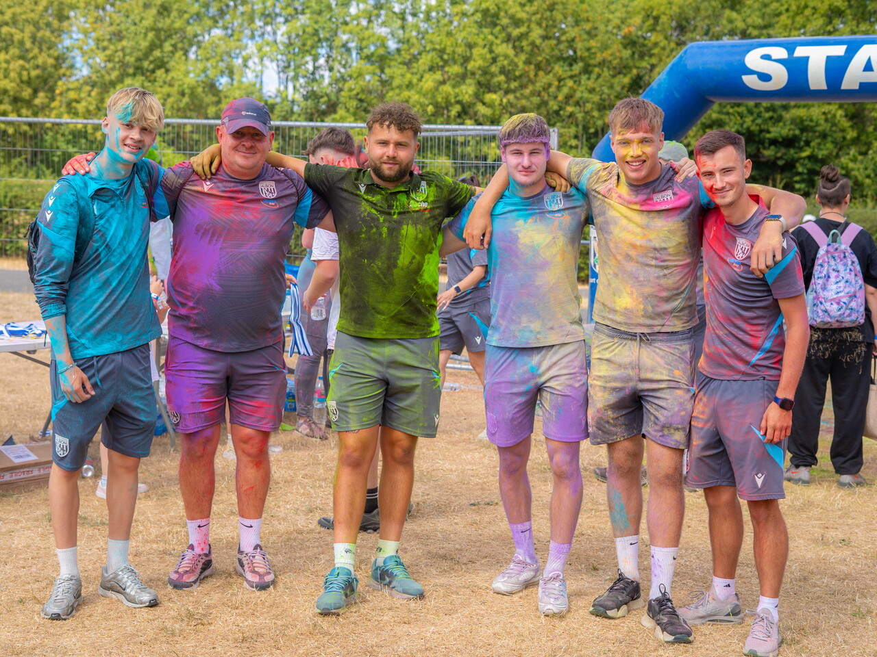 MJPL coaches posing for a photo after the Colour Run.