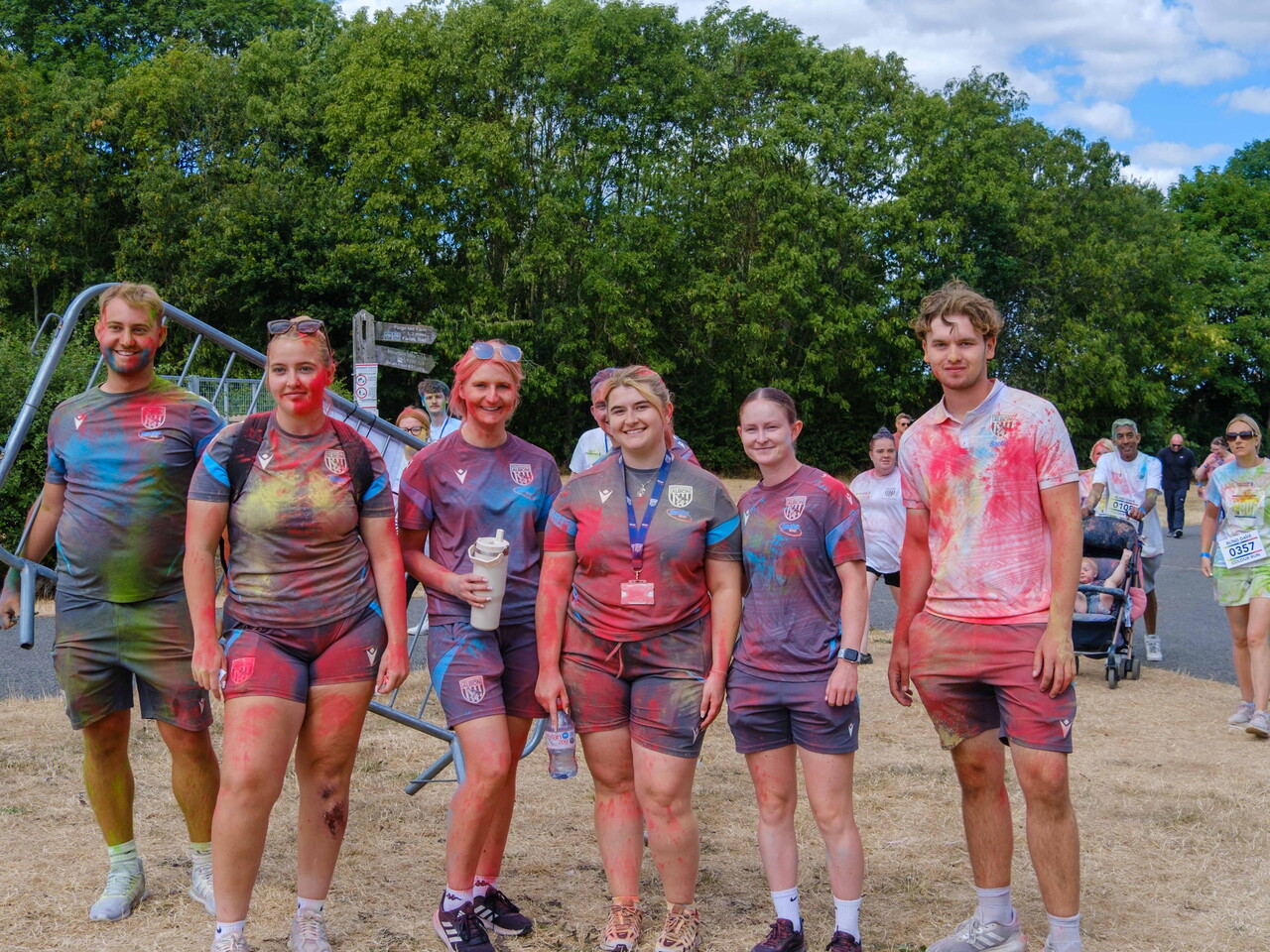 Foundation staff posing for a photo after the Colour Run.