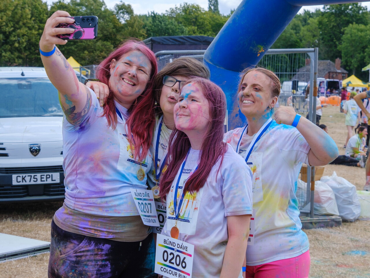 Group of participants posing for a selfie.
