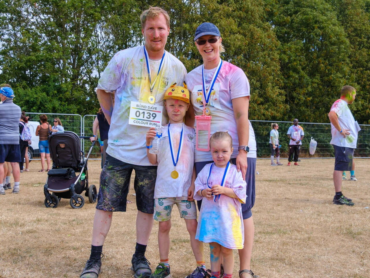Participants posing for a photo after the Colour Run.