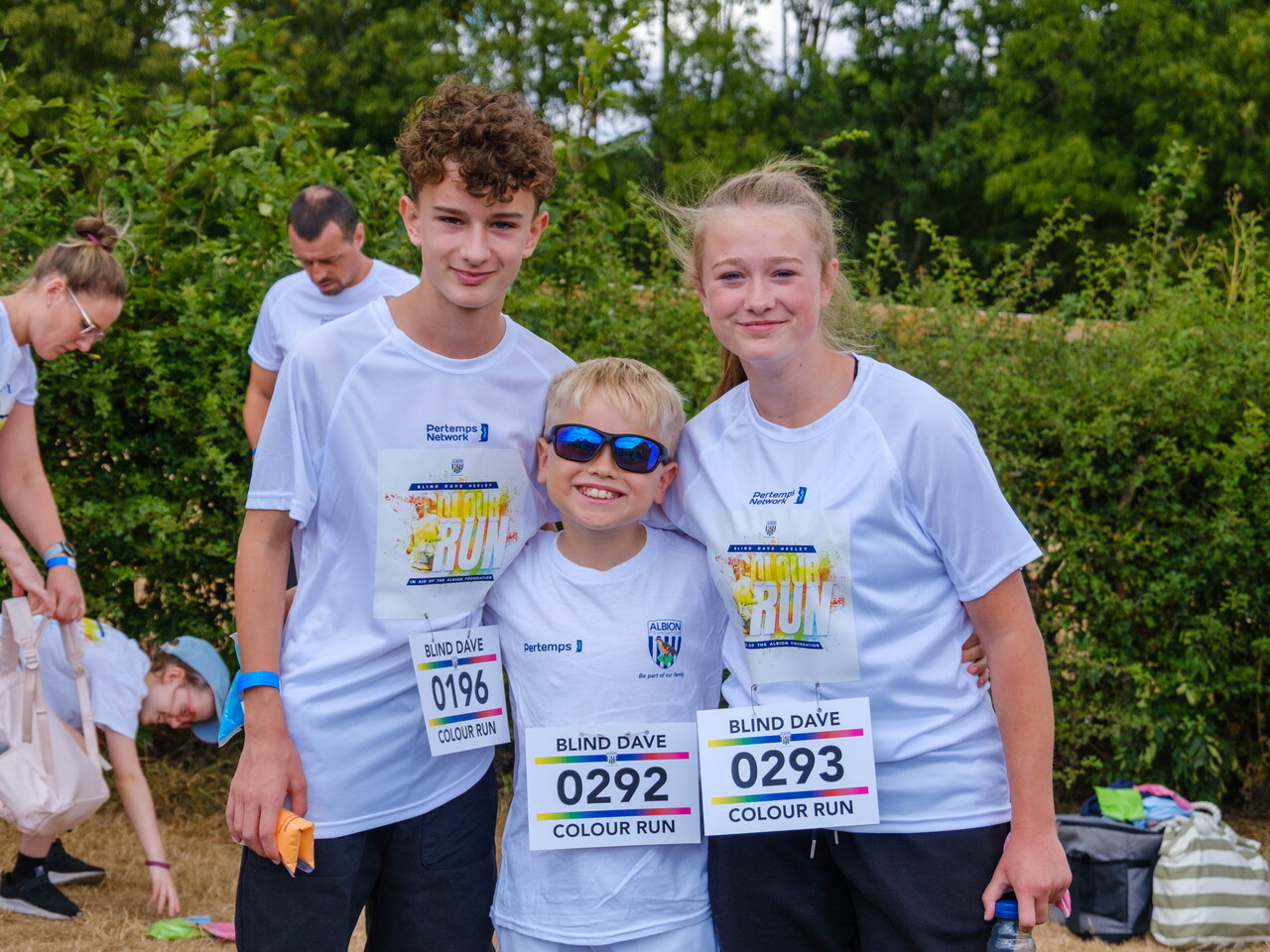 Participants posing for a photo before the Colour Run.