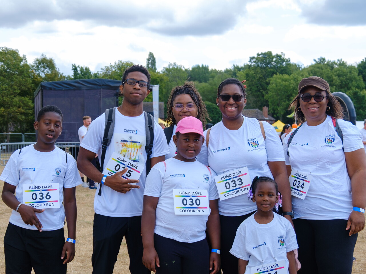 Participants posing for a photo before the Colour Run.