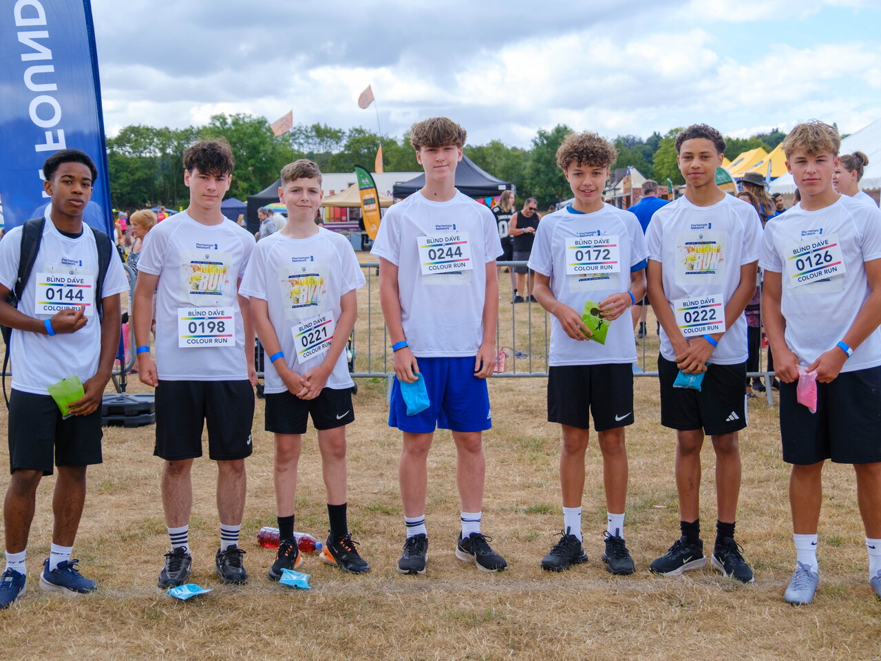 Participants posing for a photo before the Colour Run.