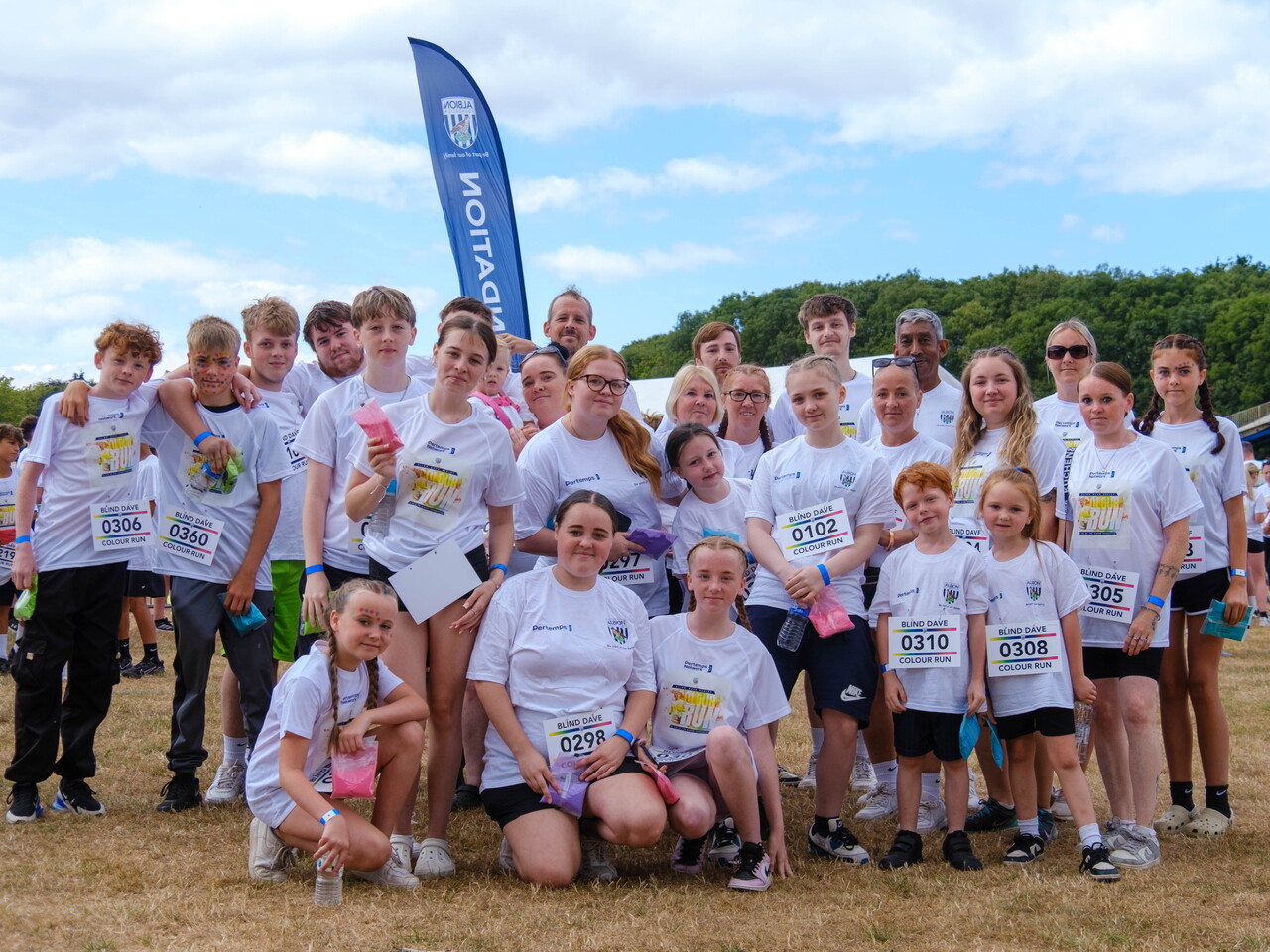 Participants posing for a photo before the Colour Run.