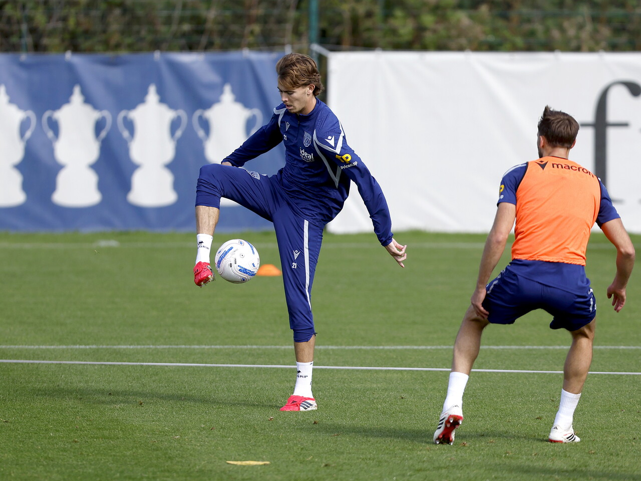 Isaac Price controlling a ball during a training session