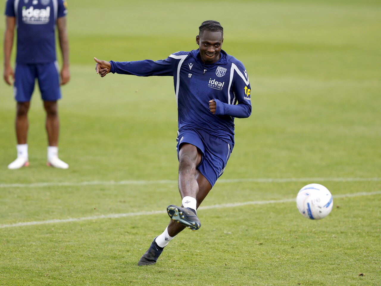 Ousmane Diakité taking a shot during a training session