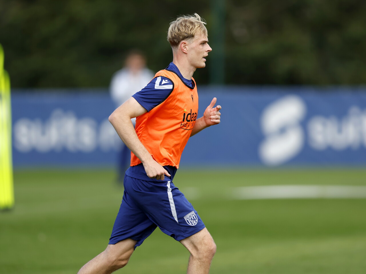 Toby Collyer running during a training session