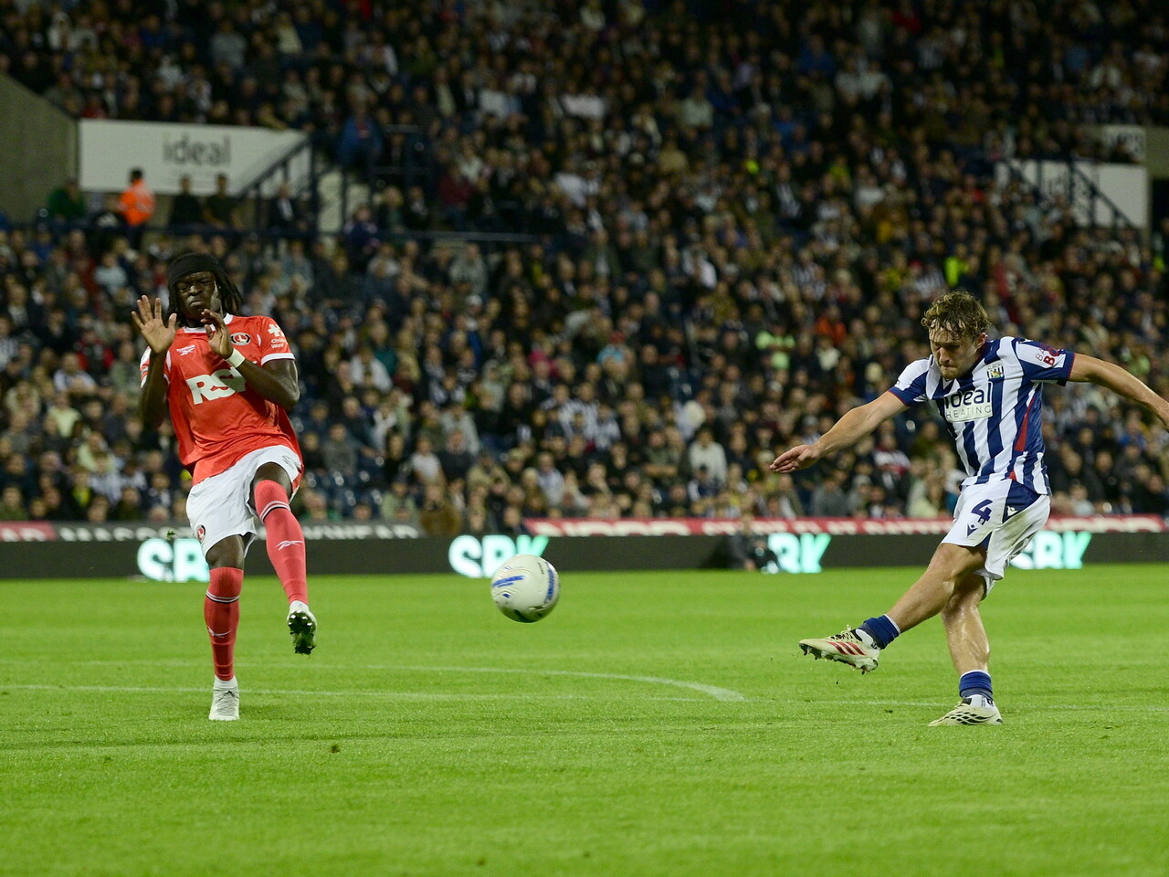 Callum Styles taking a shot and scoring against Charlton