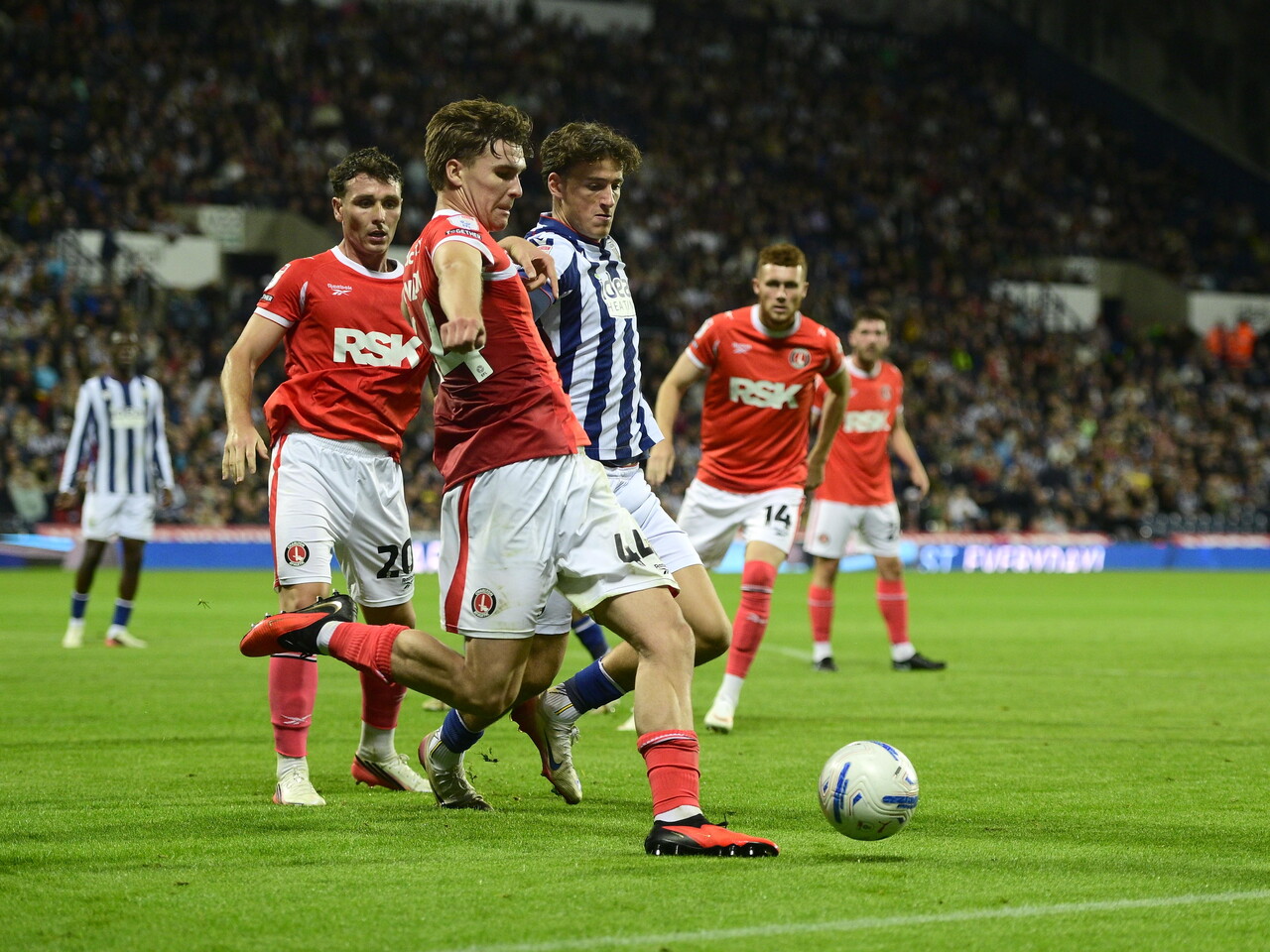 Barney Stewart putting pressure on a Charlton player