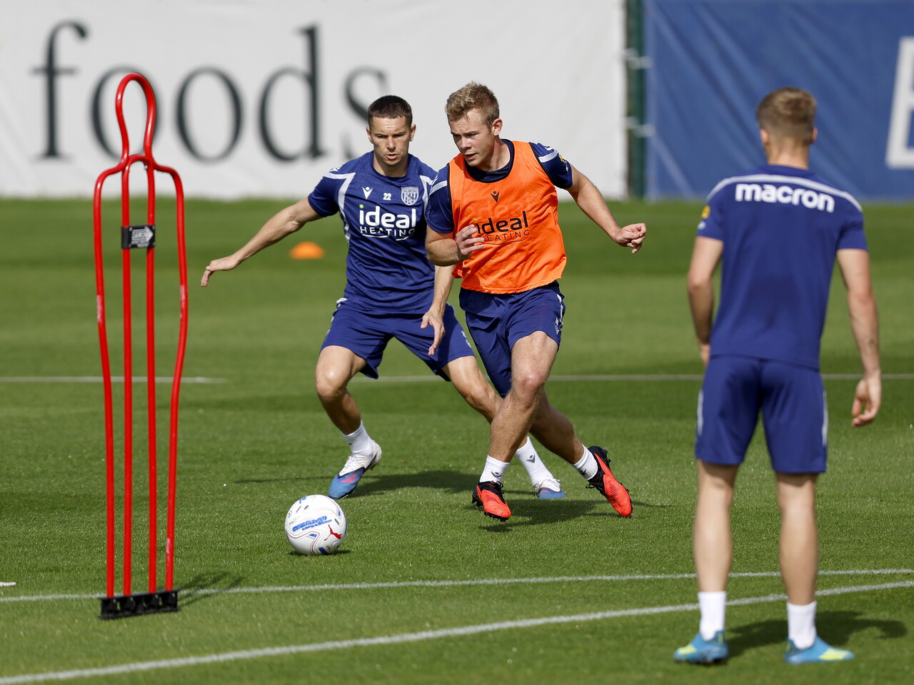 Aune Heggebø on the ball during training, closely watched by Conor Townsend