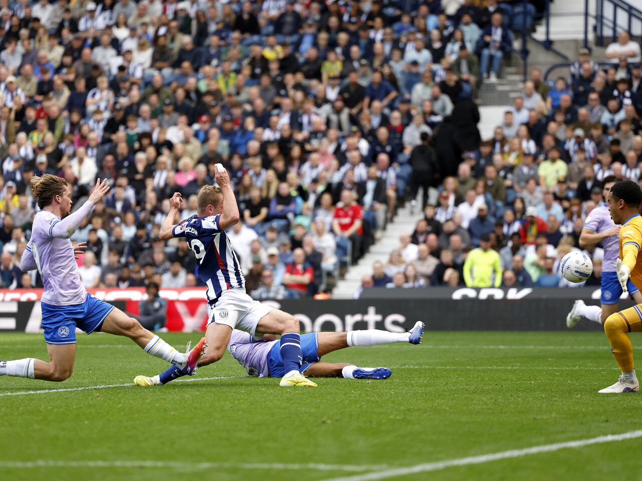 Aune Heggebo has a shot against QPR