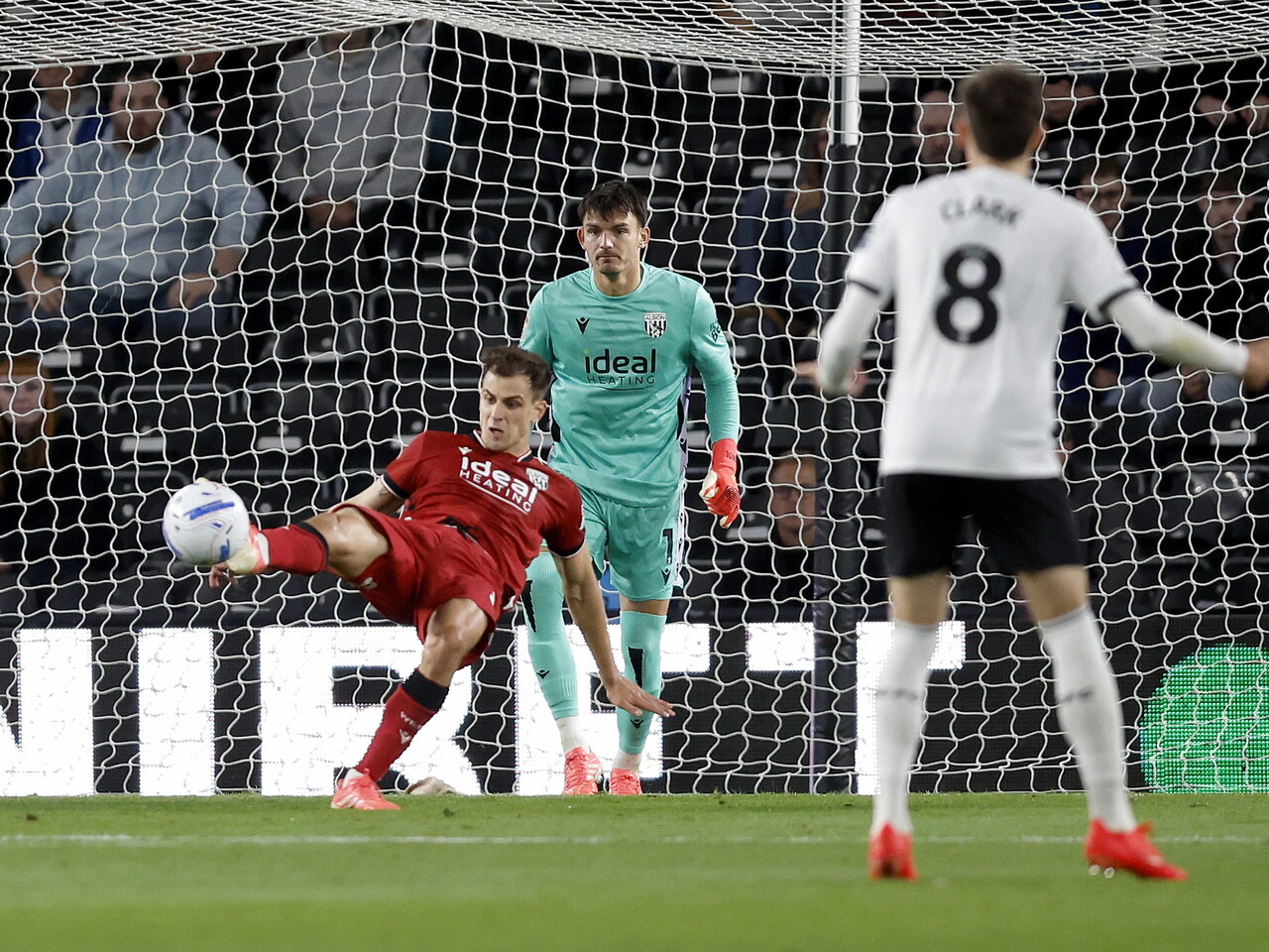 Jayson Molumby clears the ball against Derby County