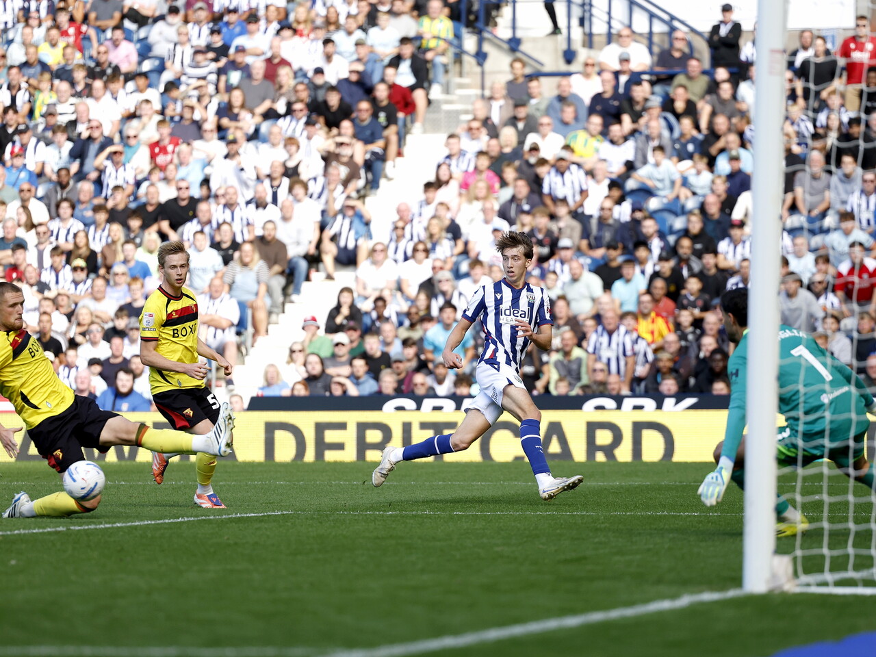 Harry Whitwell crosses the ball against Watford
