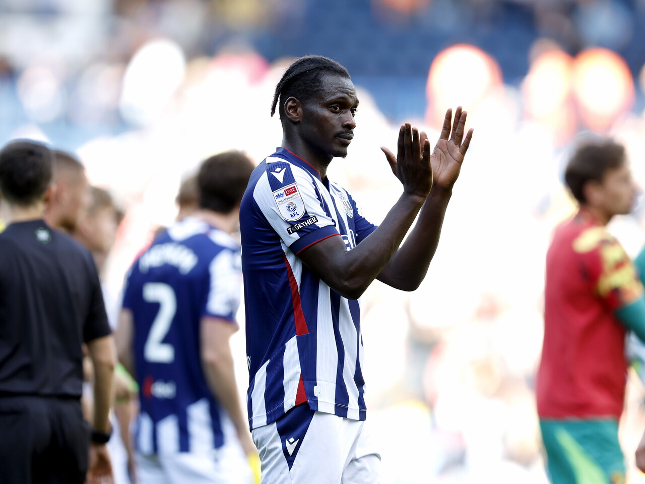 Ousmane Diakite applauds the fans after Watford