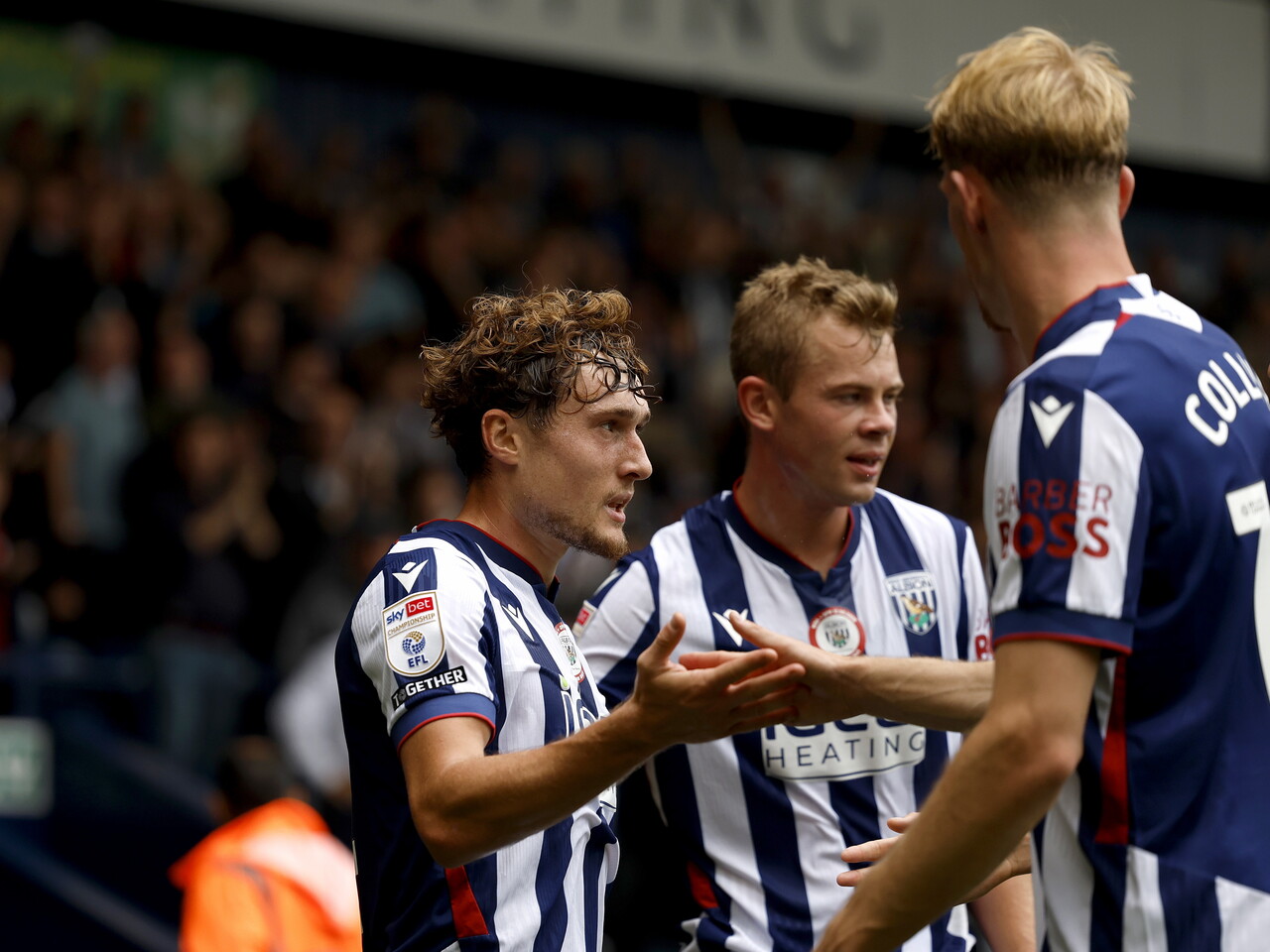 Callum Styles celebrates his goal against QPR with his teammates