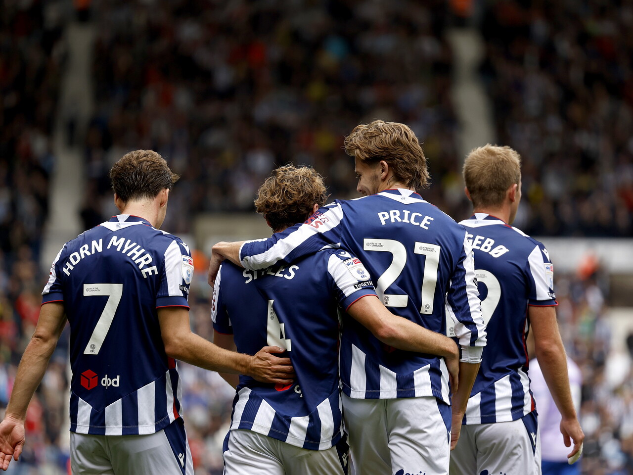 Callum Styles celebrates his goal against QPR with his teammates