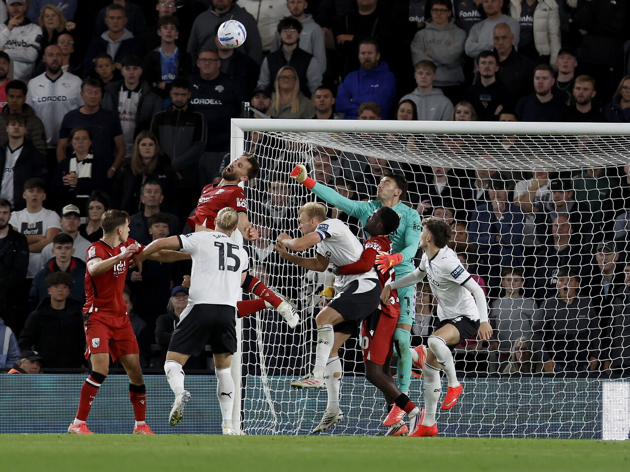 Albion defend a cross against Derby