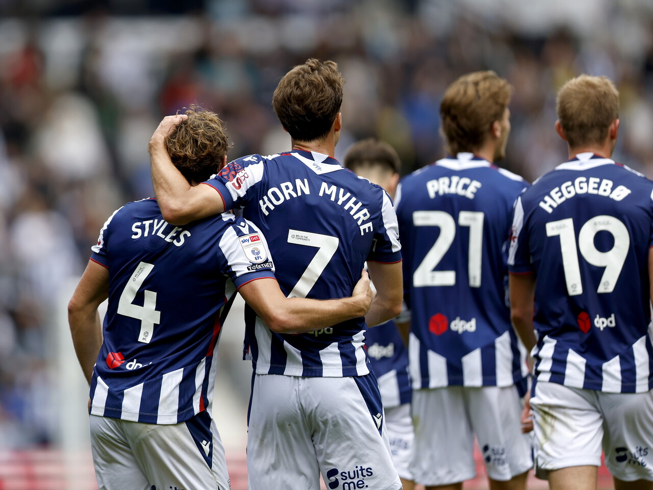 Callum Styles celebrates his goal against QPR with his teammates
