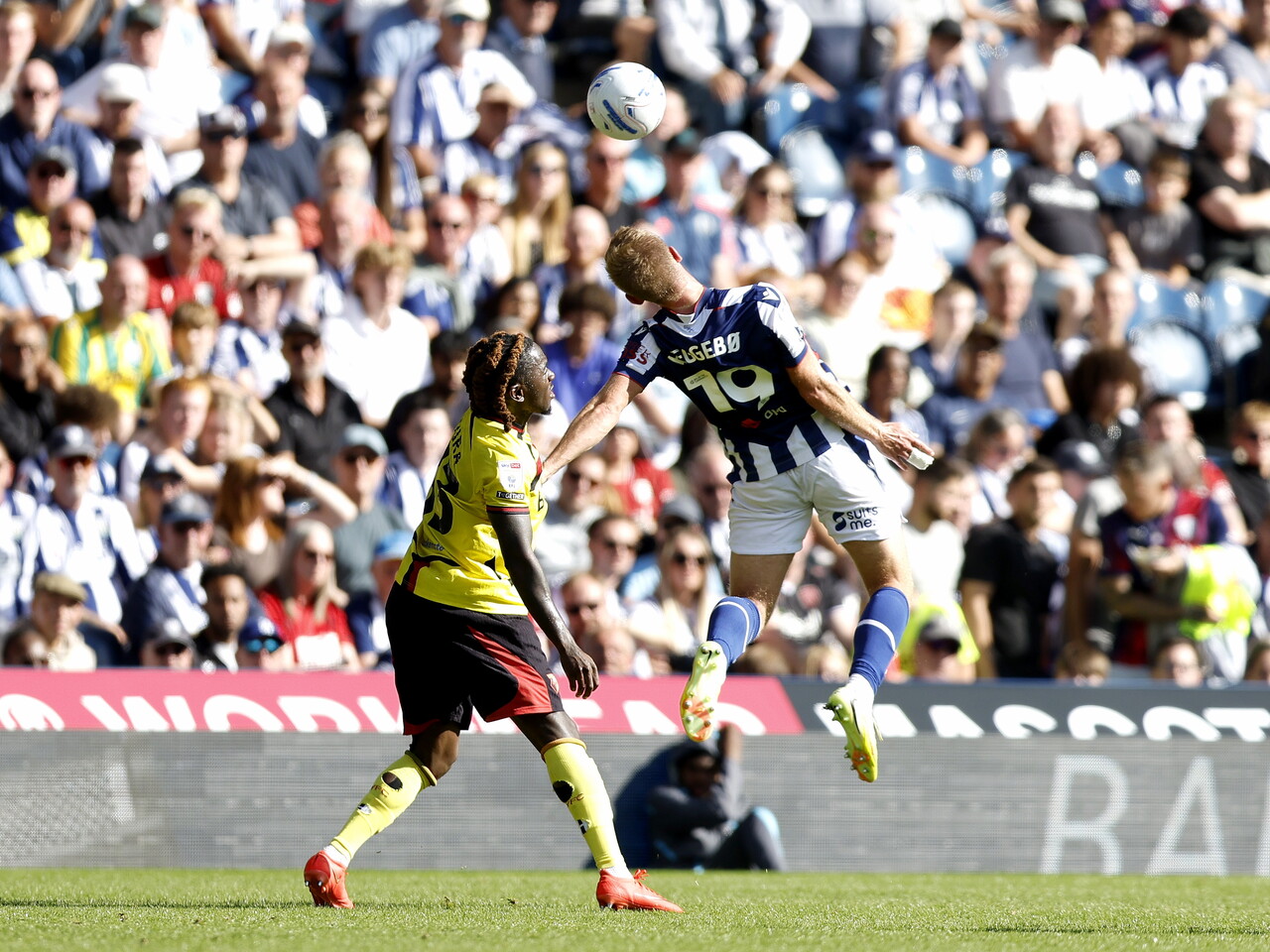 Aune Heggebo heads the ball against Watford