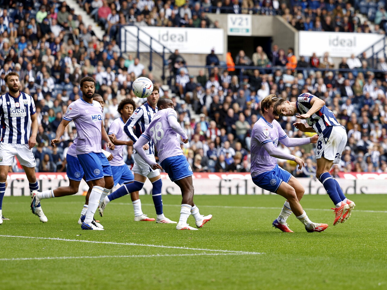 Jayson Molumby has a header against QPR