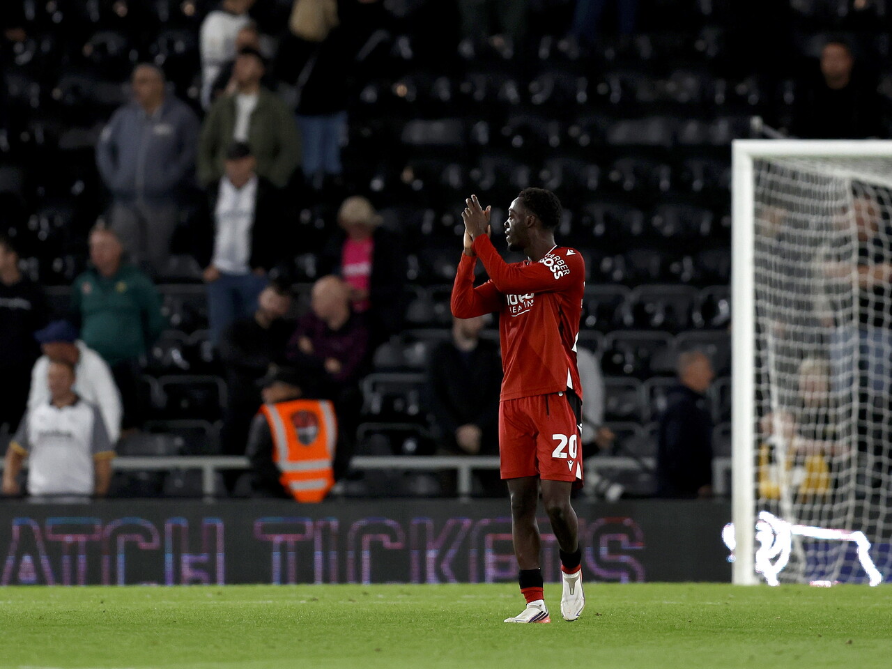 Rabby Nzingoula applauds the away fans at Derby