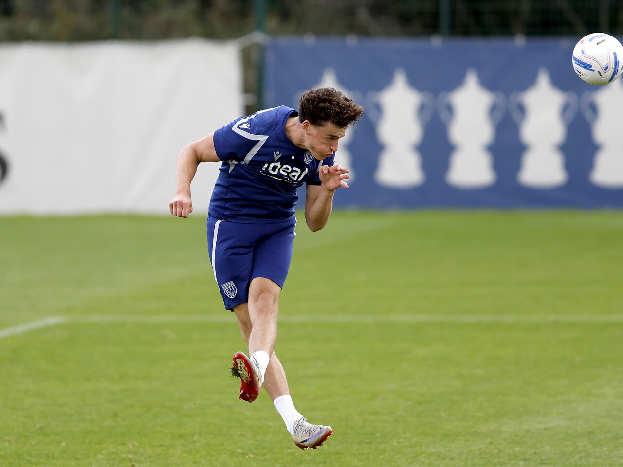 Barney Stewart heading the ball during a training session 