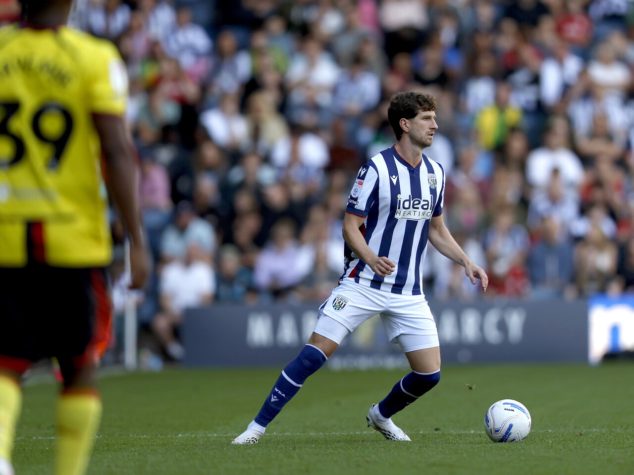 Chris Mepham on the ball against Watford