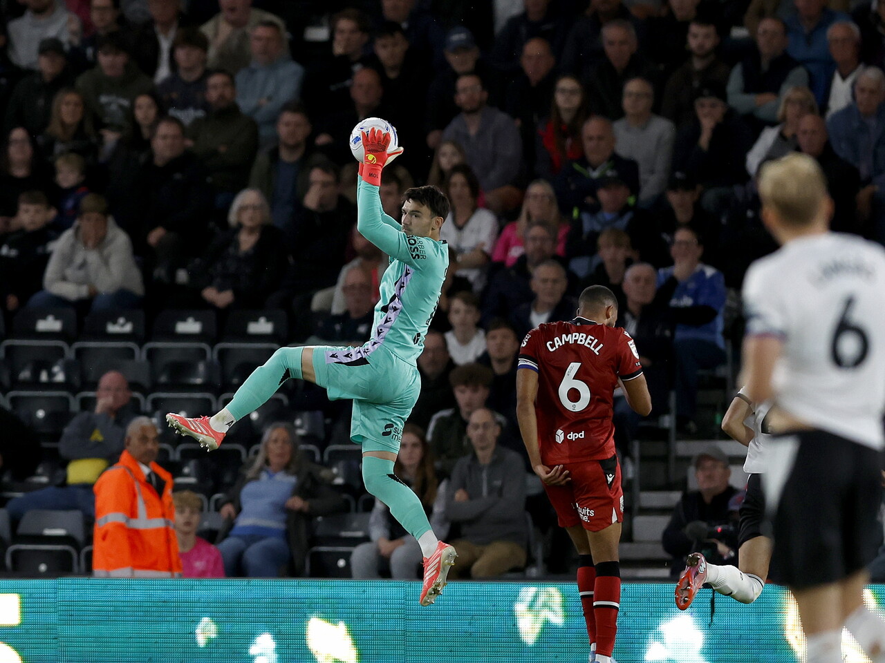 Max O'Leary catches the ball against Derby