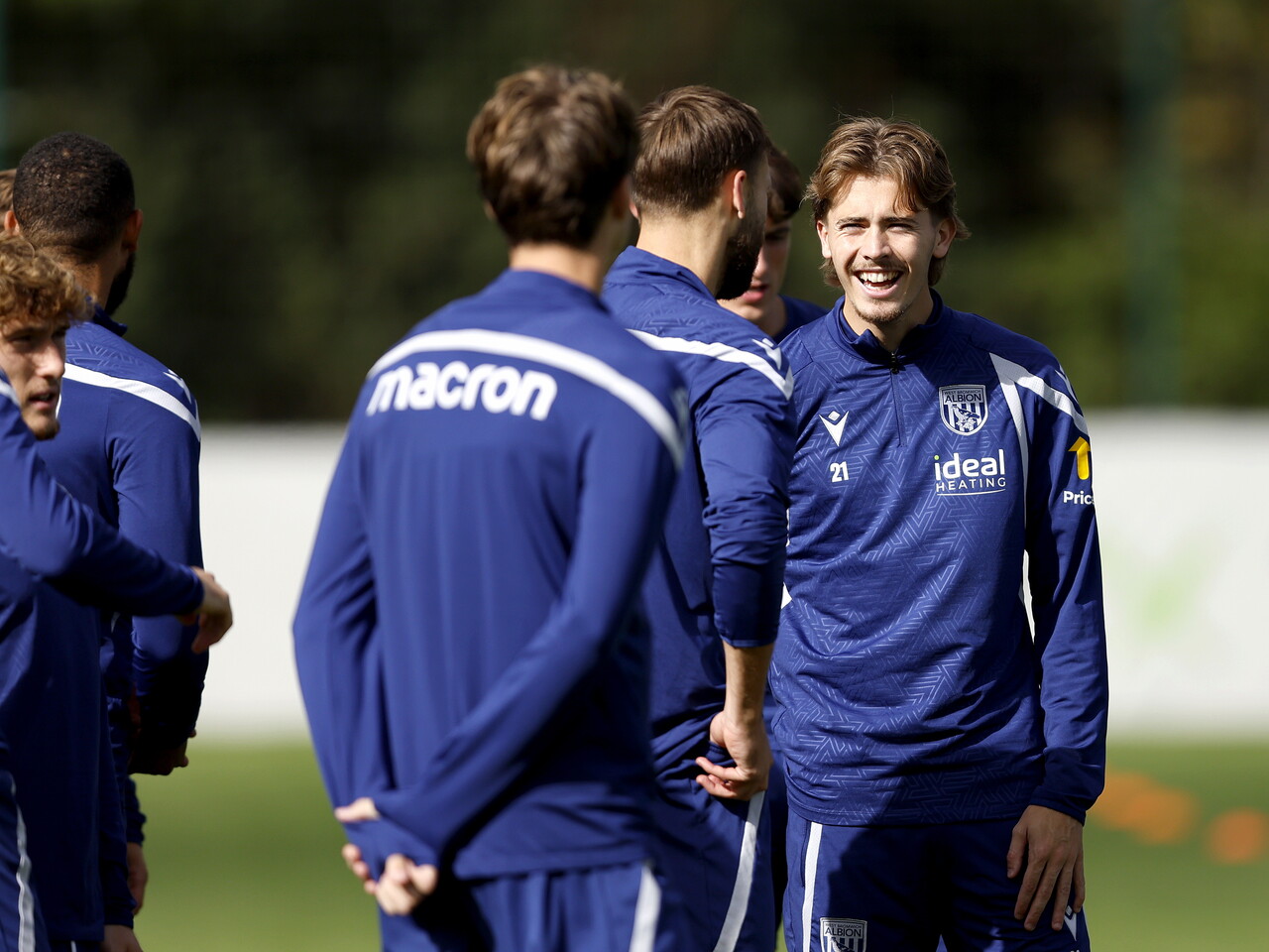 Isaac Price laughing before a training session