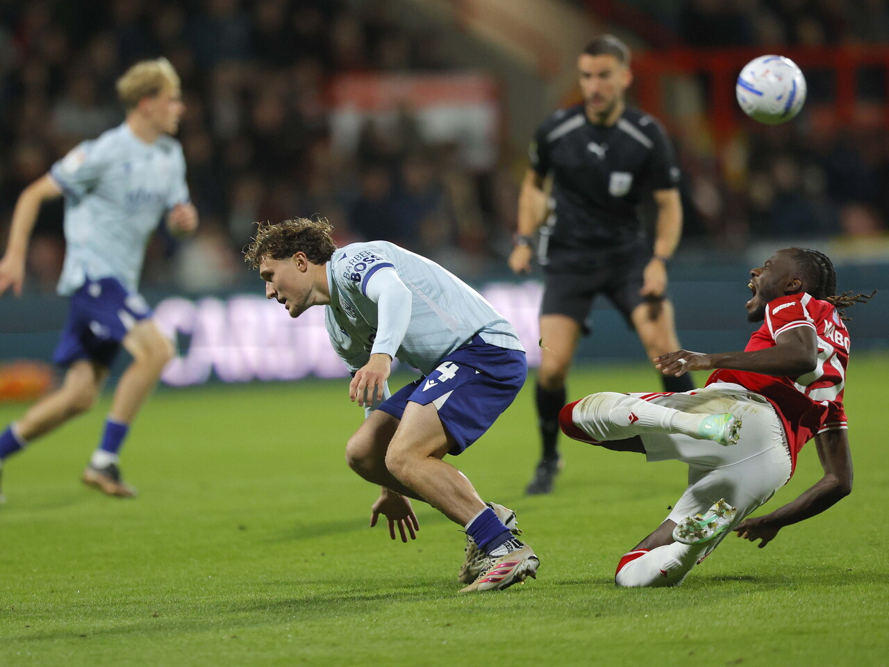 Callum Styles wins a free kick against Wrexham