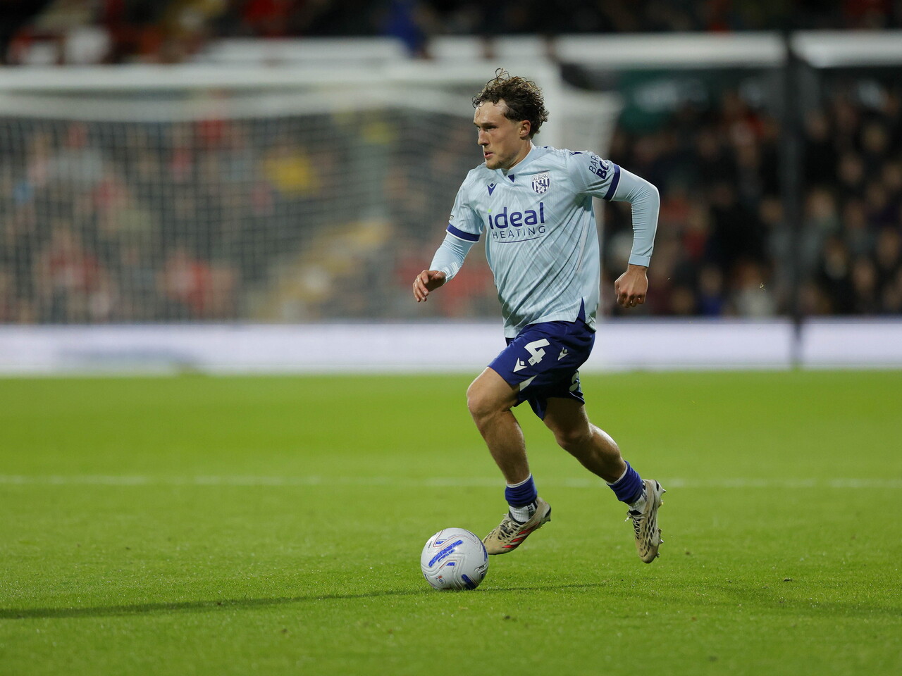 Callum Styles on the ball against Wrexham