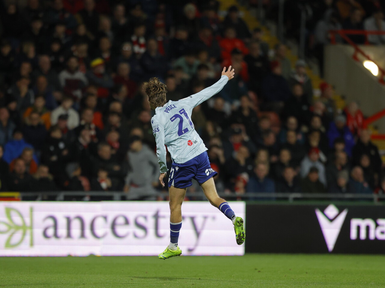 Isaac Price celebrates his goal against Wrexham