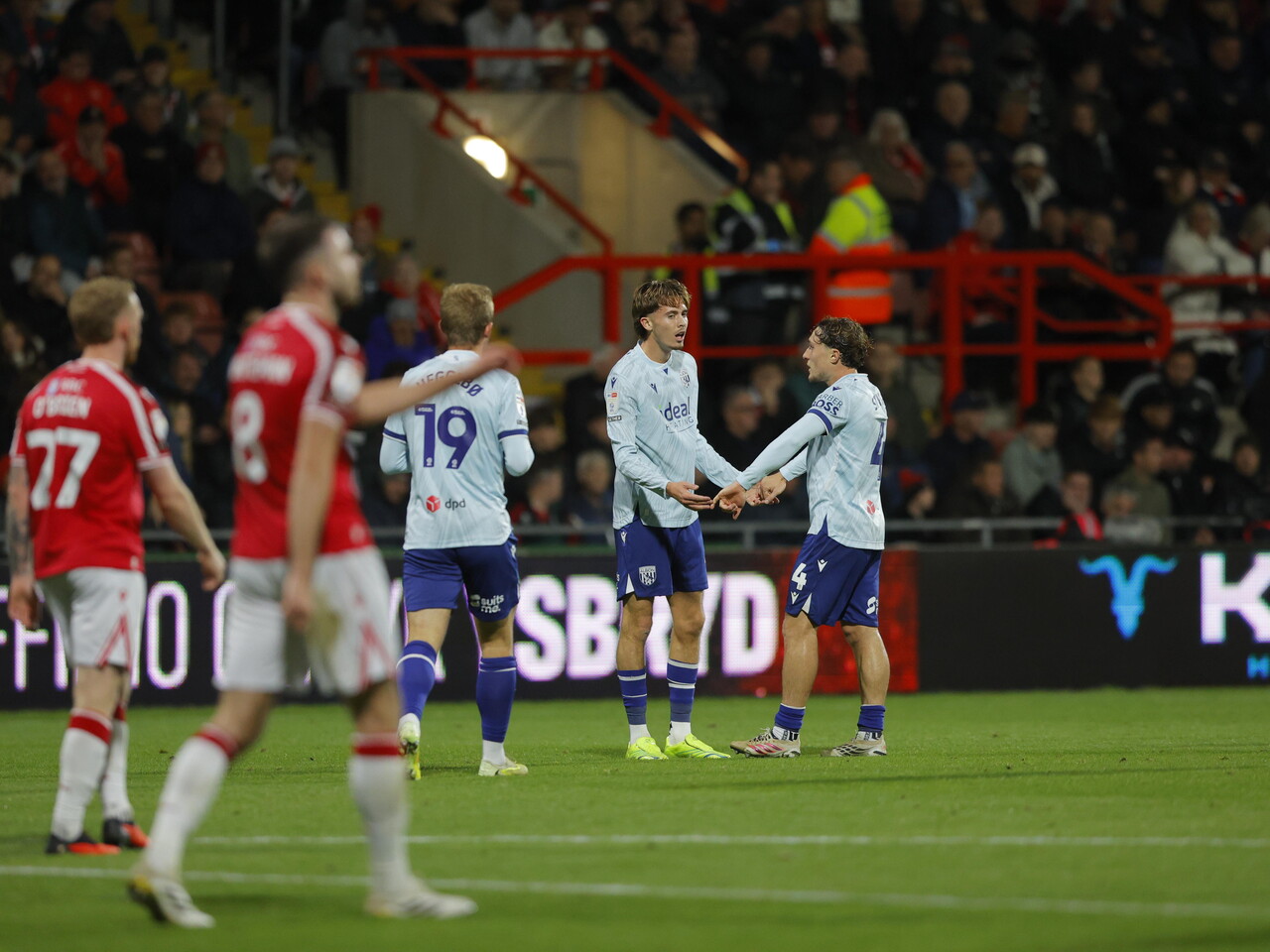 Callum Styles and Isaac Price celebrate Price's goal 