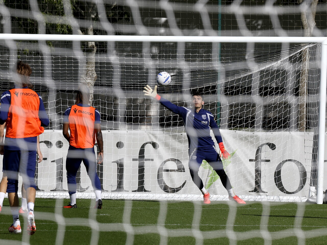 Max O'Leary making a save during a training session