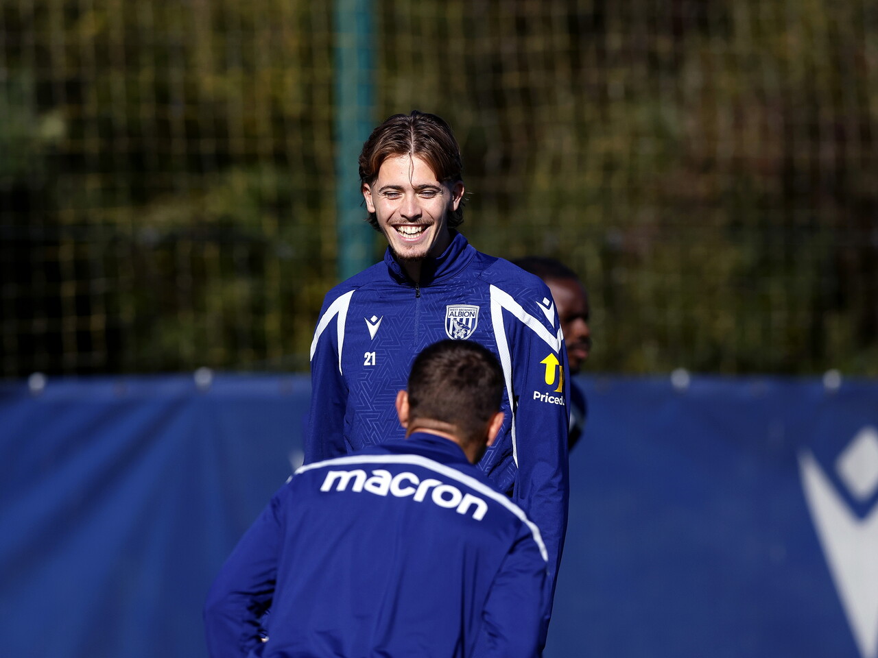 Isaac Price smiling during a training session