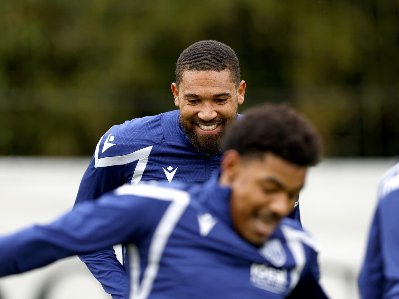 George Campbell and Kareem Tunde smiling during a training session