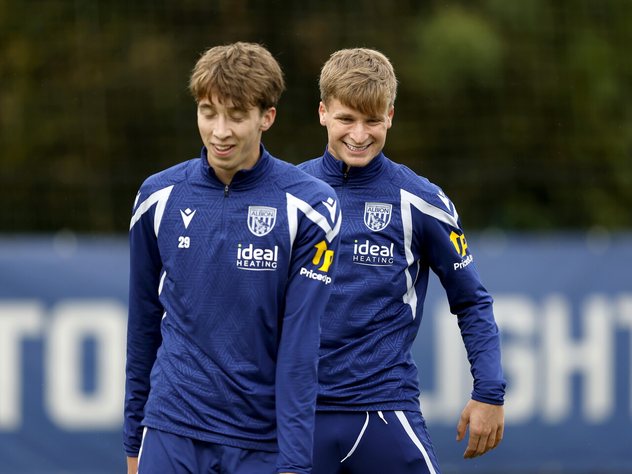 Harry Whitwell and JJ Morgan smiling during a training session