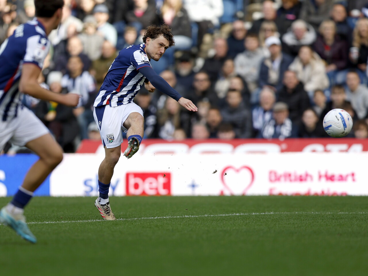 Callum Styles has a shot against Blackburn