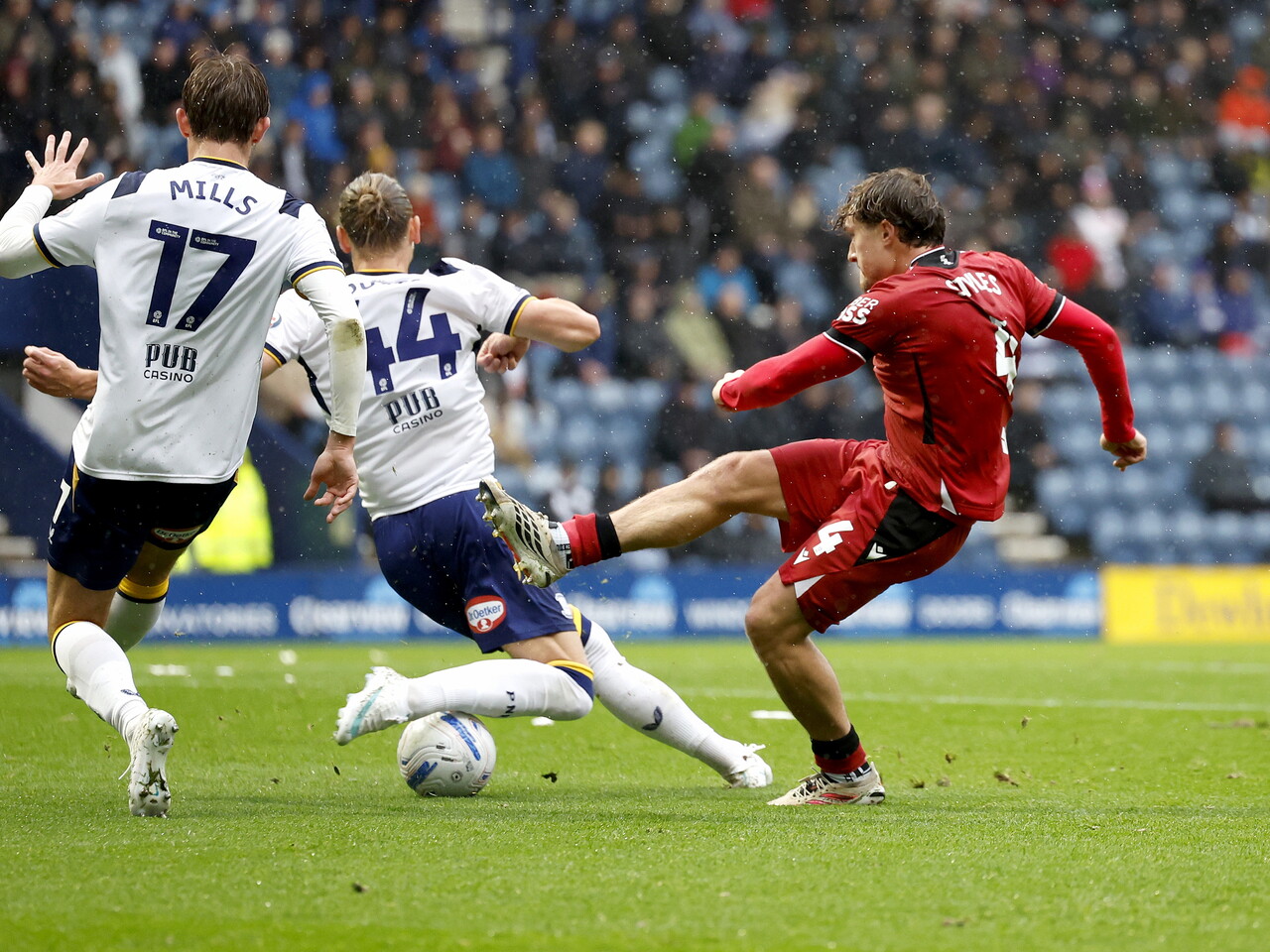 Callum Styles has a shot against Preston