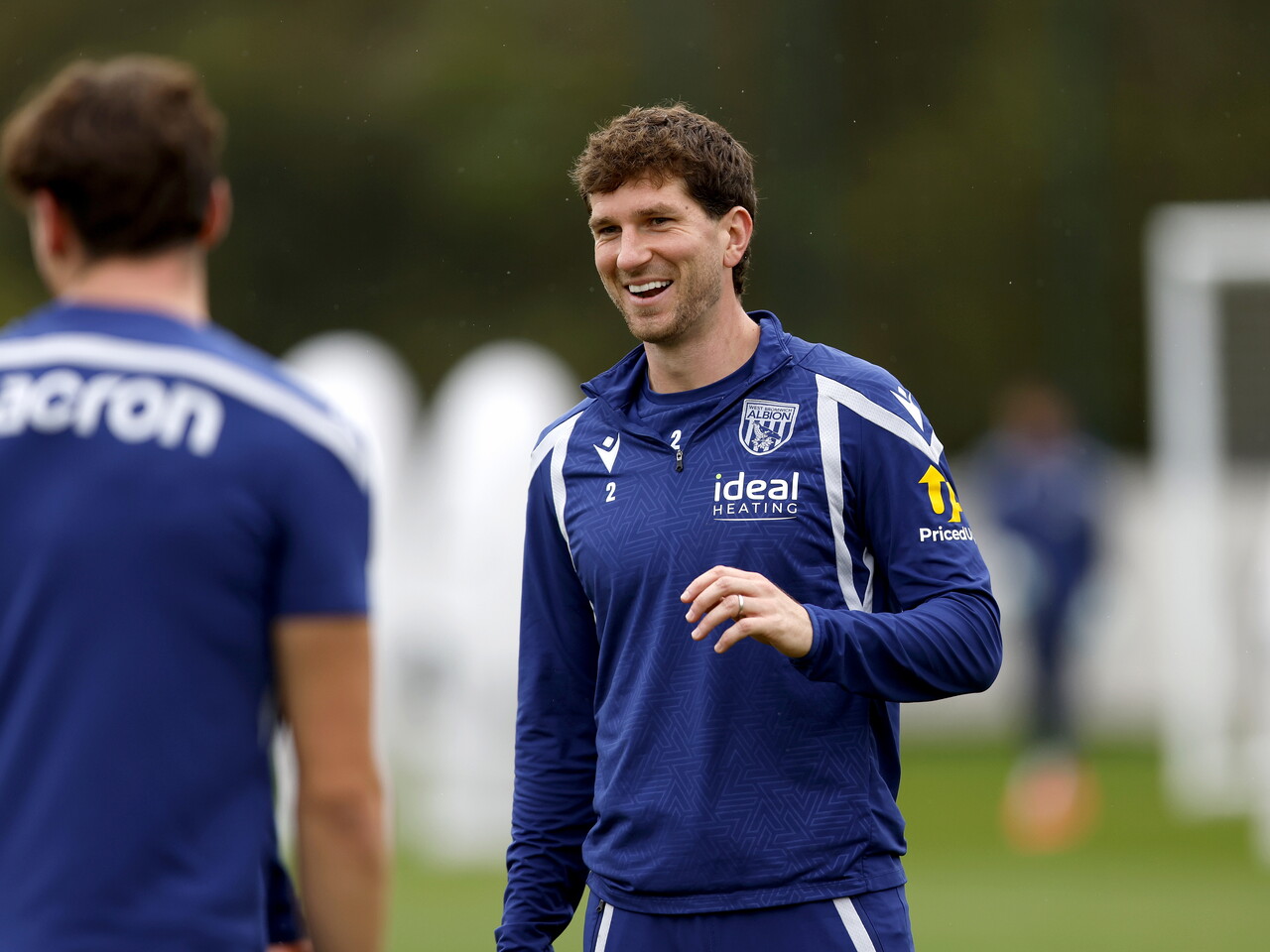 Chris Mepham smiling during a training session