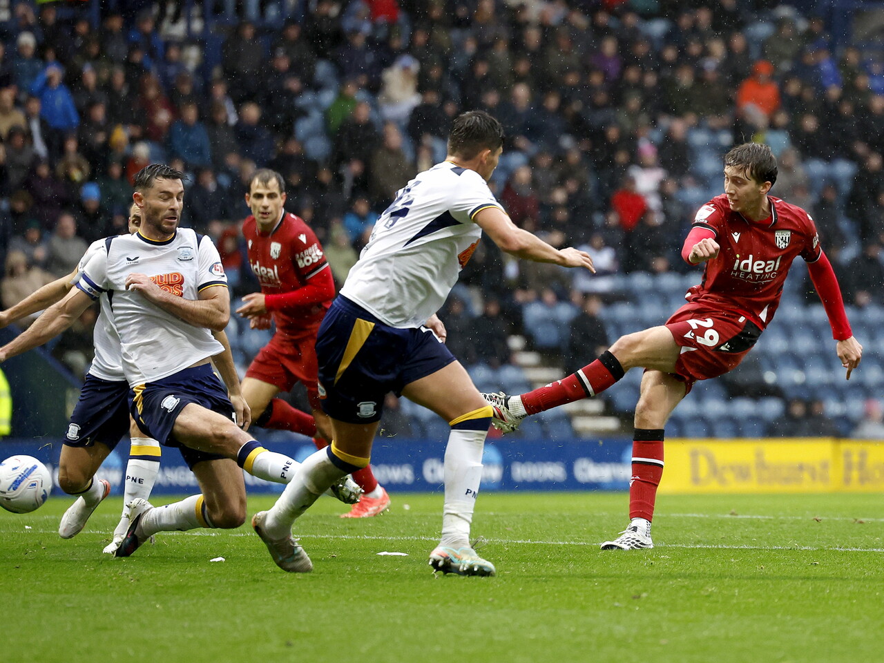 Harry Whitwell has a shot against Preston