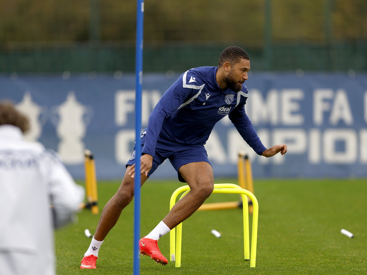 George Campbell warming up during a training session