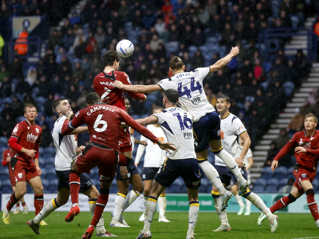 Chris Mepham has a header against Preston