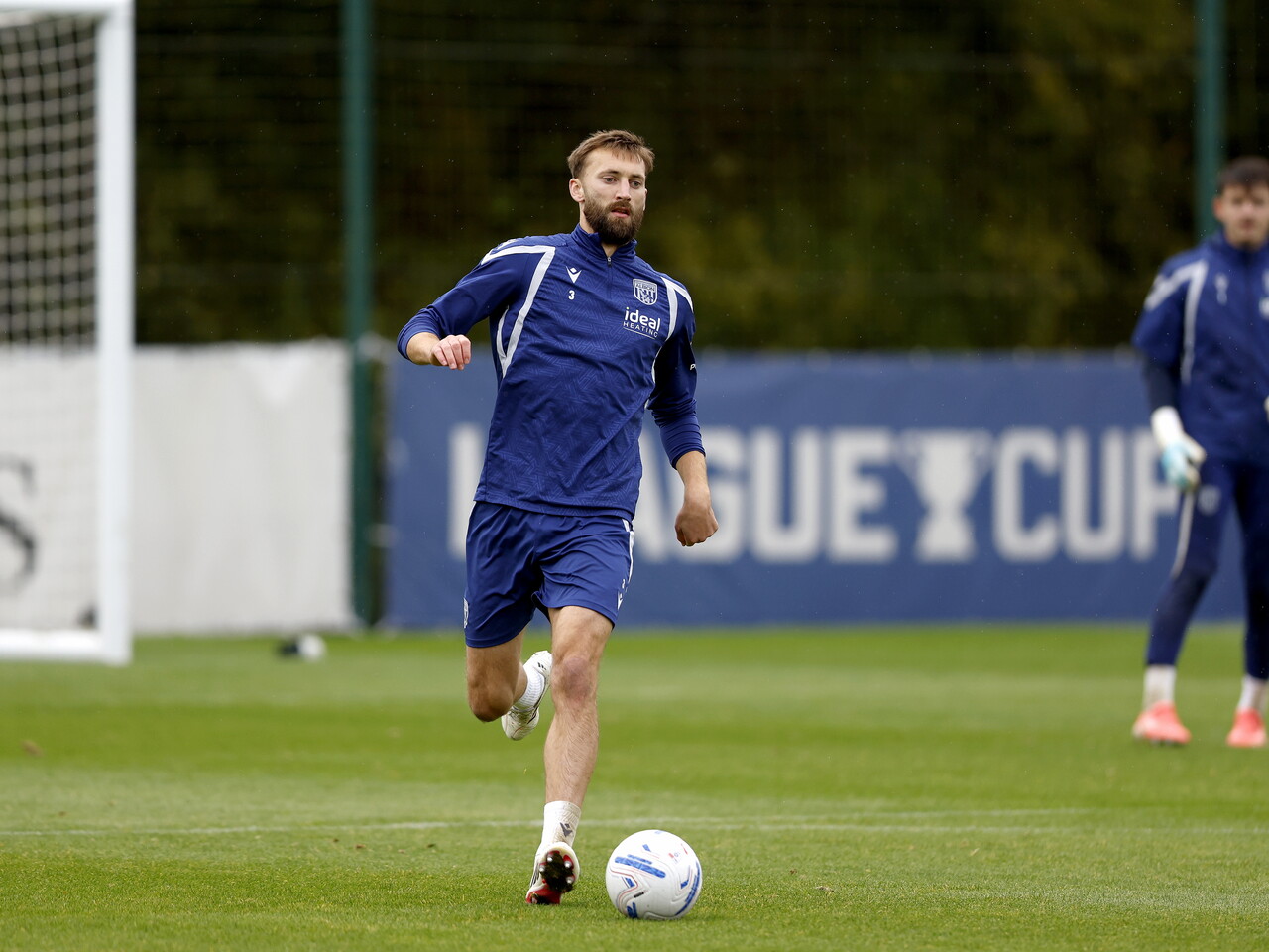 Nat Phillips running with the ball during training 