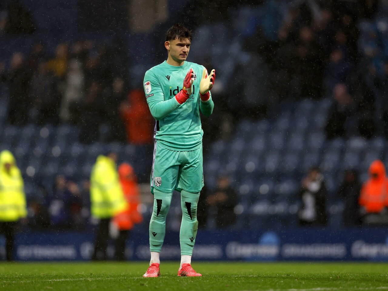 Max O'Leary applauds the fans at full-time